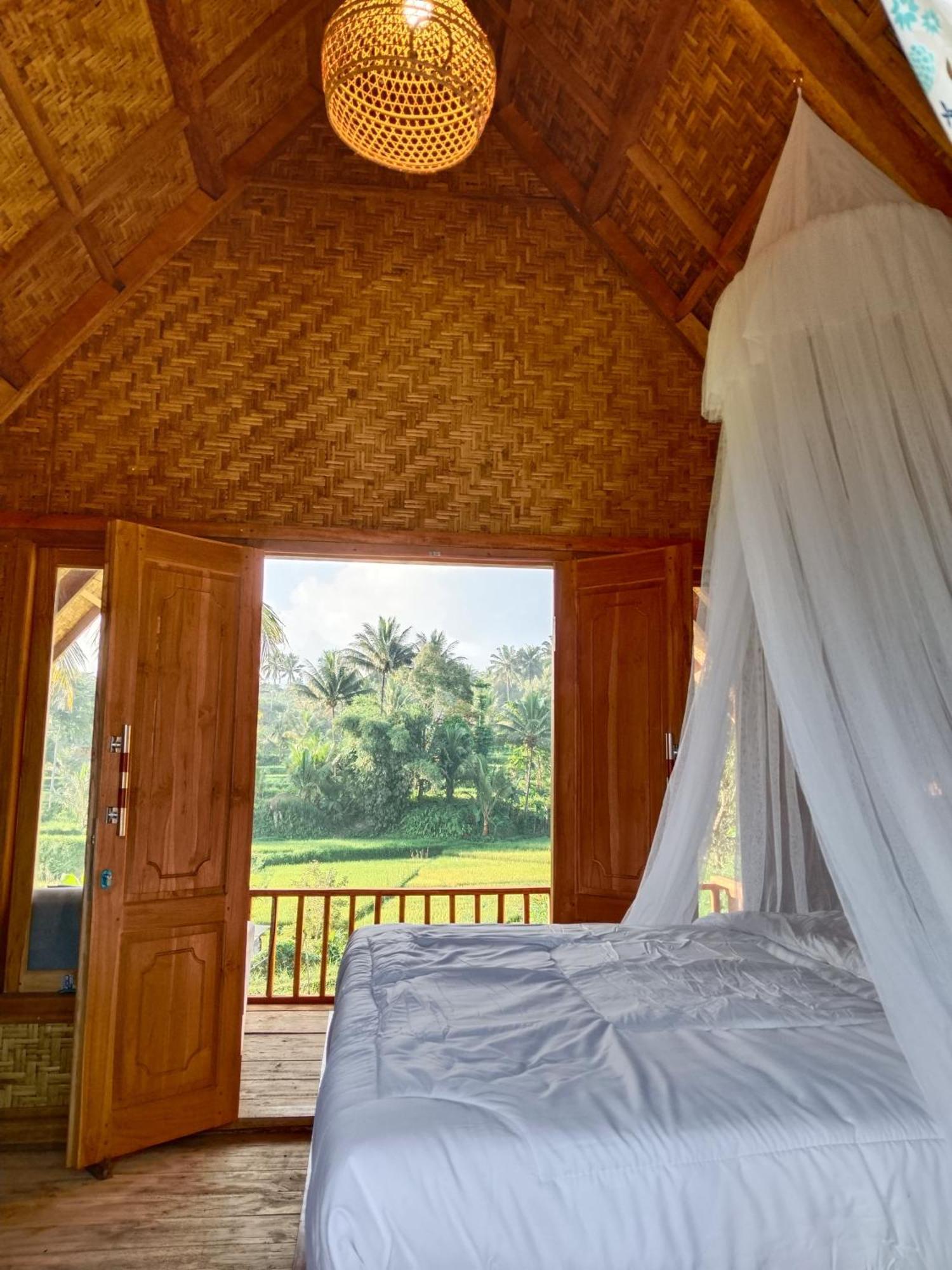 Dewi Rinjani Homestay เตเตบาตู ภายนอก รูปภาพ