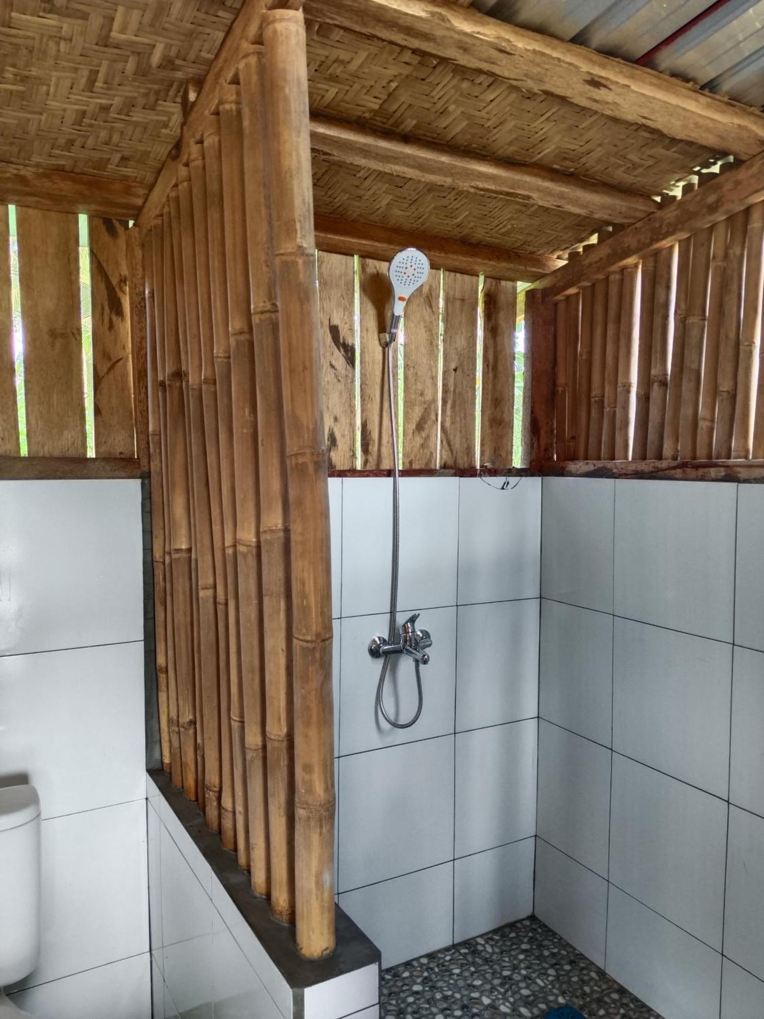 Dewi Rinjani Homestay เตเตบาตู ภายนอก รูปภาพ